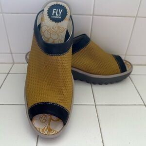 Size 40 leather Fly London wedge clogs. Like new!